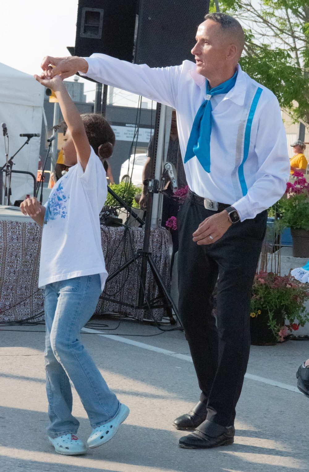 SVJETLANA MLINAREVIC THE CARILLON
Mila Lomni gets a spin during a waltz from Kevin Chief of the Norman Chief Memorial Dancers at Summer in the City on June 13, 2025 in Steinbach.
