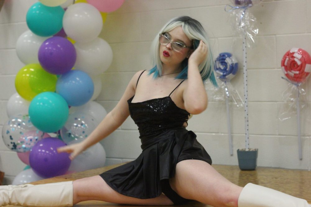 TONI DE GUZMAN THE CARILLON
Lou Ferguson (Miss Pocket) performs on stage while lip syncing to Physical by Dua Lipa.