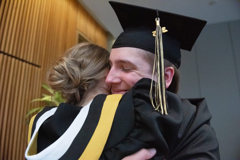 SVJETLANA MLINAREVIC THE CARILLON
Steinbach Regional Secondary School graduate Kayden Sterk smiles while hugging his girlfriend Anika Brown after the graduation ceremony at the Winnipeg Convention Centre on June 24, 2025.