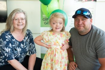 SVJETLANA MLINAREVIC THE CARILLON
Eight-year-old Olivia Priebe poses with Children's Rehabilitation Foundation fund development officer Mia Dunn and her father Viktor during the Steinbach Community Foundation AGM on June 18, 2025 in Steinbach. Olivia was one of two children to receive an enhanced tricycle from funding from SCF.