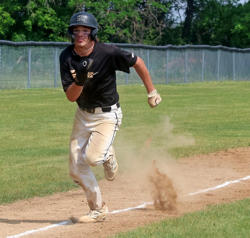 Action from the MHSAA baseball championships in Stonewall. (Cassidy Dankochik The Carillon)