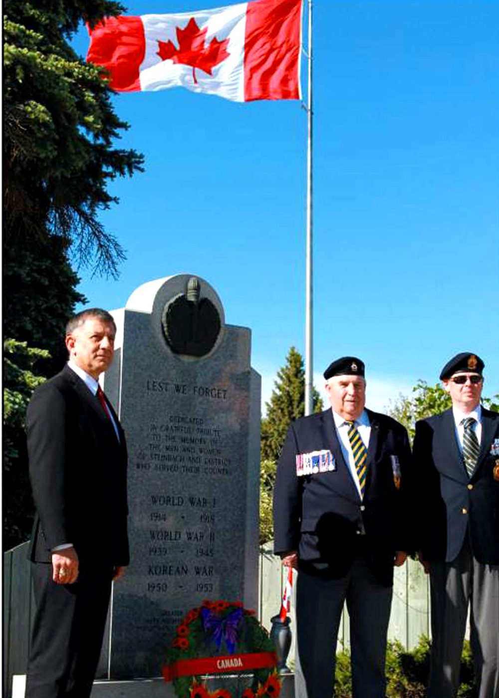 CARILLON ARCHIVES
Provencher MP Ted Falk, is accompanied by Steinbach Legion president Keith Duncan and Cpl. Glenn Syme at this year’s D-Day commemoration ceremony in Steinbach, June 6, 2014.