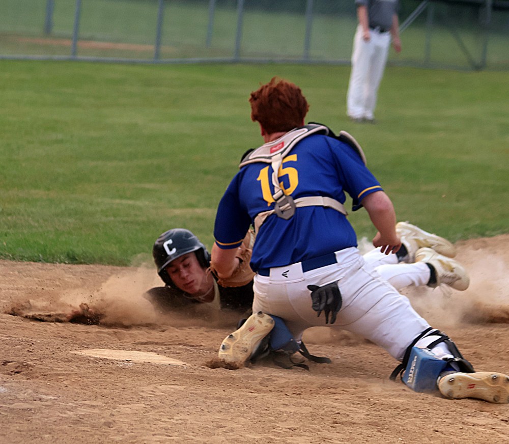 Action from the MHSAA baseball championships in Stonewall. (Cassidy Dankochik The Carillon)