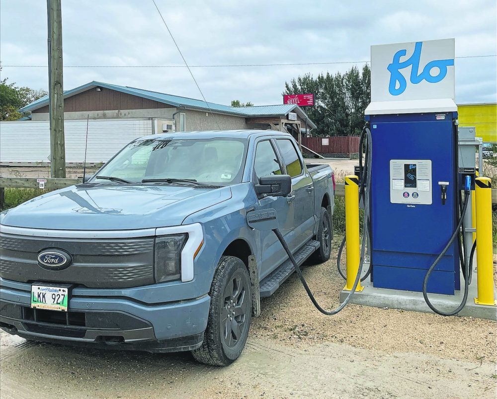 CARILLON ARCHIVES
A charging station in Ile des Chenes in the RM of Ritchot with one of the Ford F-150 Lightning trucks charging. The municipality will make the Ford as well as electric vans and SUVs available for car sharing for residents this fall.