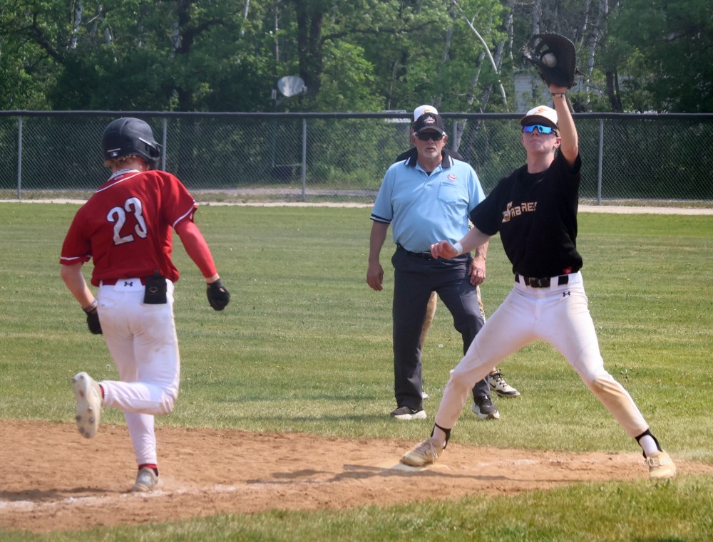 Action from the MHSAA baseball championships in Stonewall. (Cassidy Dankochik The Carillon)