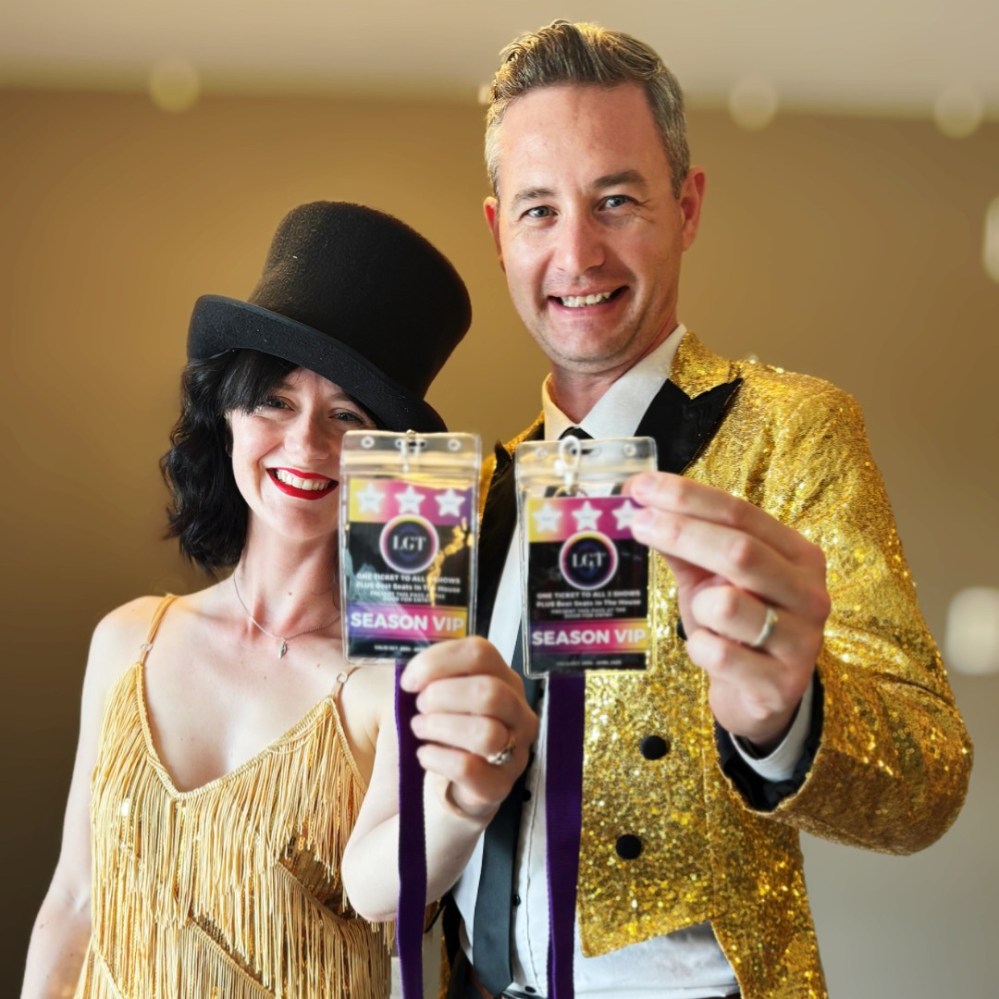 SUPPLIED
Looking Glass Theatre co-artistic directors Laura Kathleen Turner and Marc A. Moir show off the season tickets available for the upcoming season.