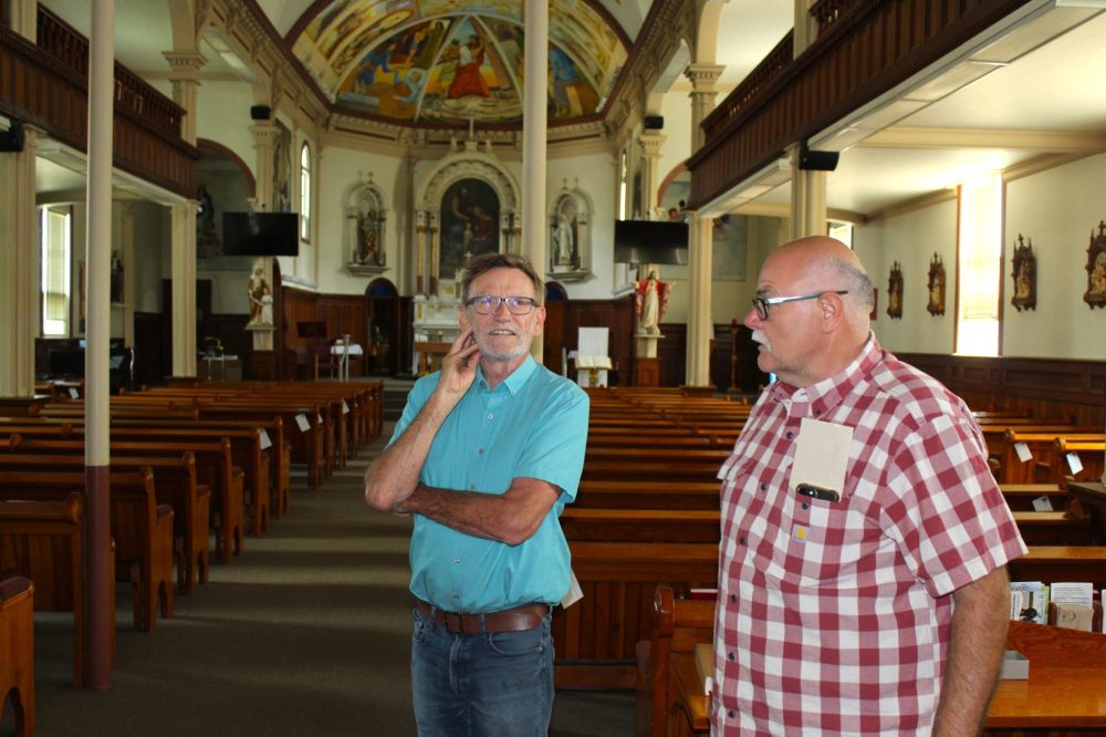 CHRIS GAREAU THE CARILLON
D. F. Plett Historical Research Foundation board chair Royden Loewen (left) tours the St Joachim Roman Catholic Church in La Broquerie with church restoration committee president Lucien Grenier.