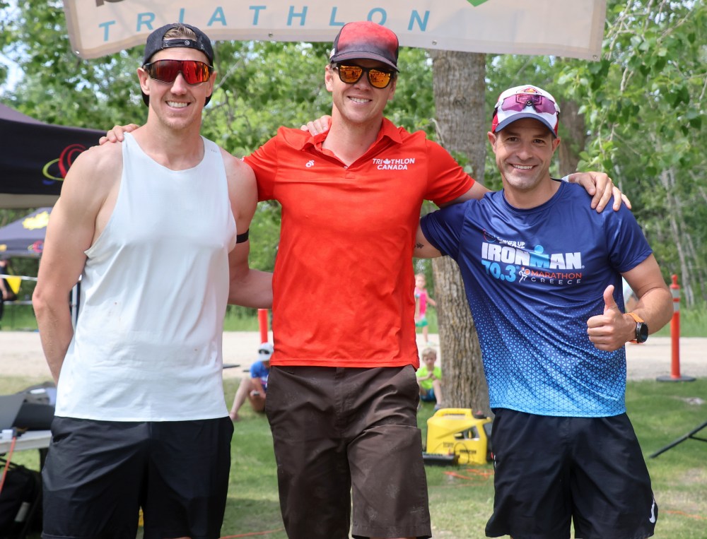Patrick Labossiere (centre) topped the podium at the St Malo Triathlon. Julien Gagnot and Chris Morrissette rounded out the podium for the men's Olympic distance. (Cassidy Dankochik The Carillon)