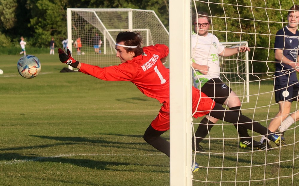 The Thunder FC keeper couldn't control this rebound, with the Division 3 Hanover Strikers converting on the ensuing rebound for a first-half goal in their 5-1 win June 17. (Cassidy Dankochik The Carillon)