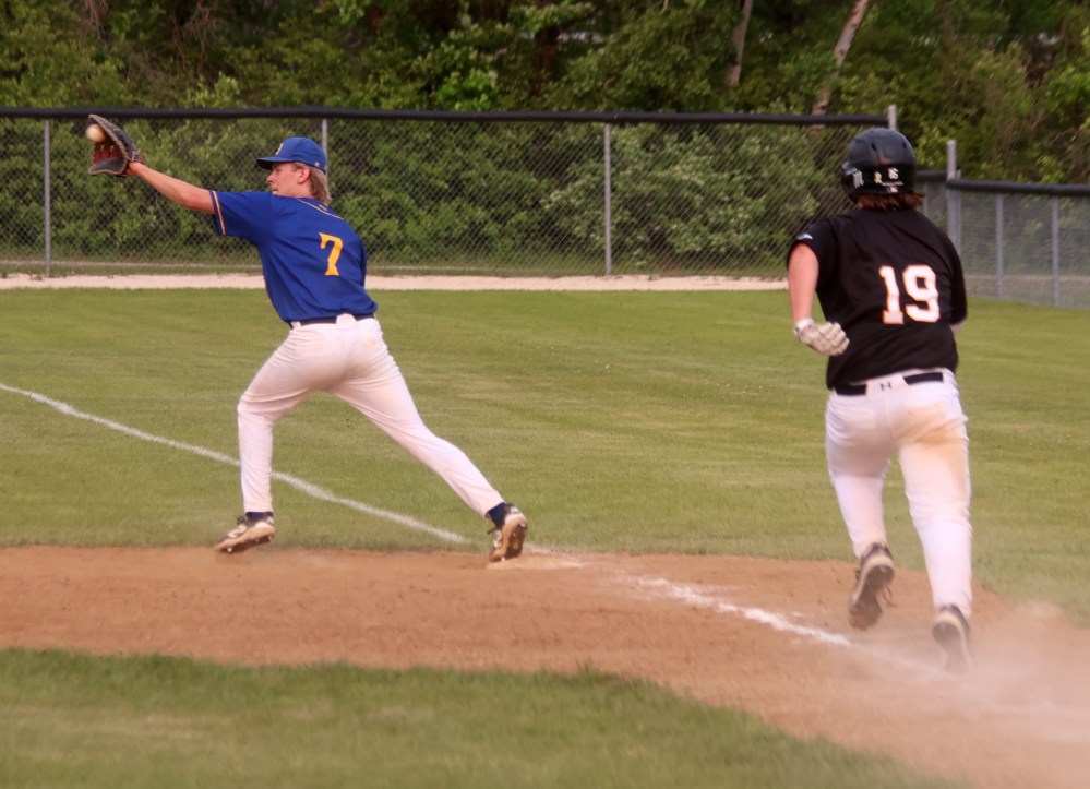 Action from the MHSAA baseball championships in Stonewall. (Cassidy Dankochik The Carillon)