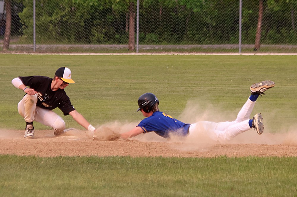 Action from the MHSAA baseball championships in Stonewall. (Cassidy Dankochik The Carillon)