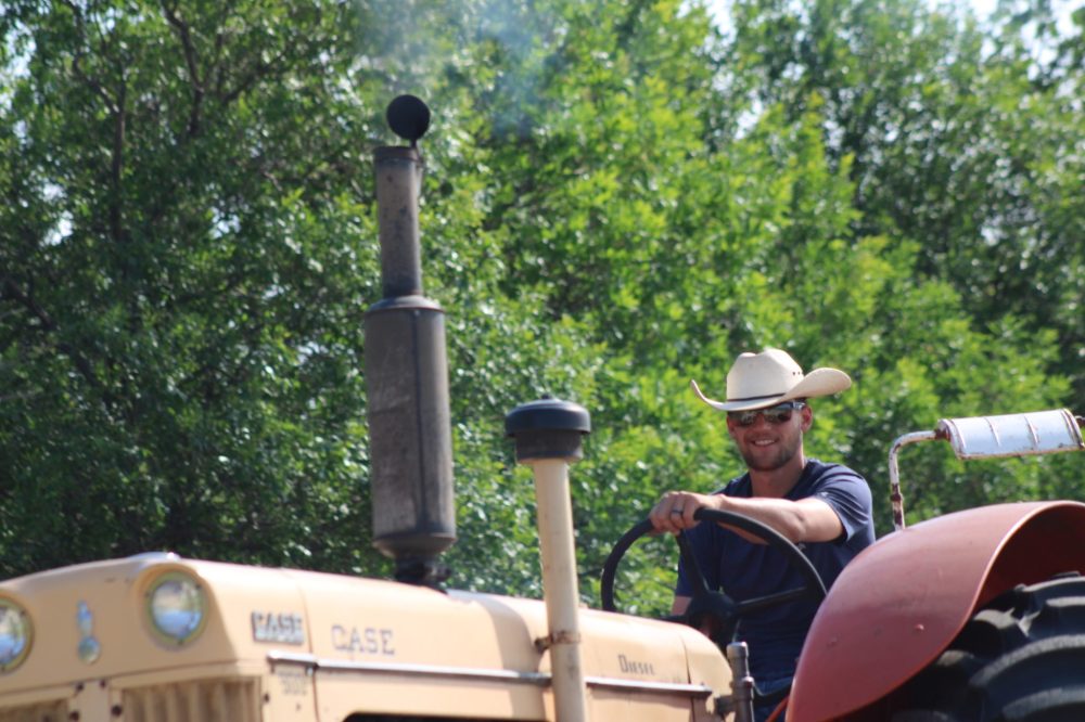 GREG VANDERMEULEN THE CARILLON
Transformation Tractor Ride: The driver o this Case had a smile for onlookers.