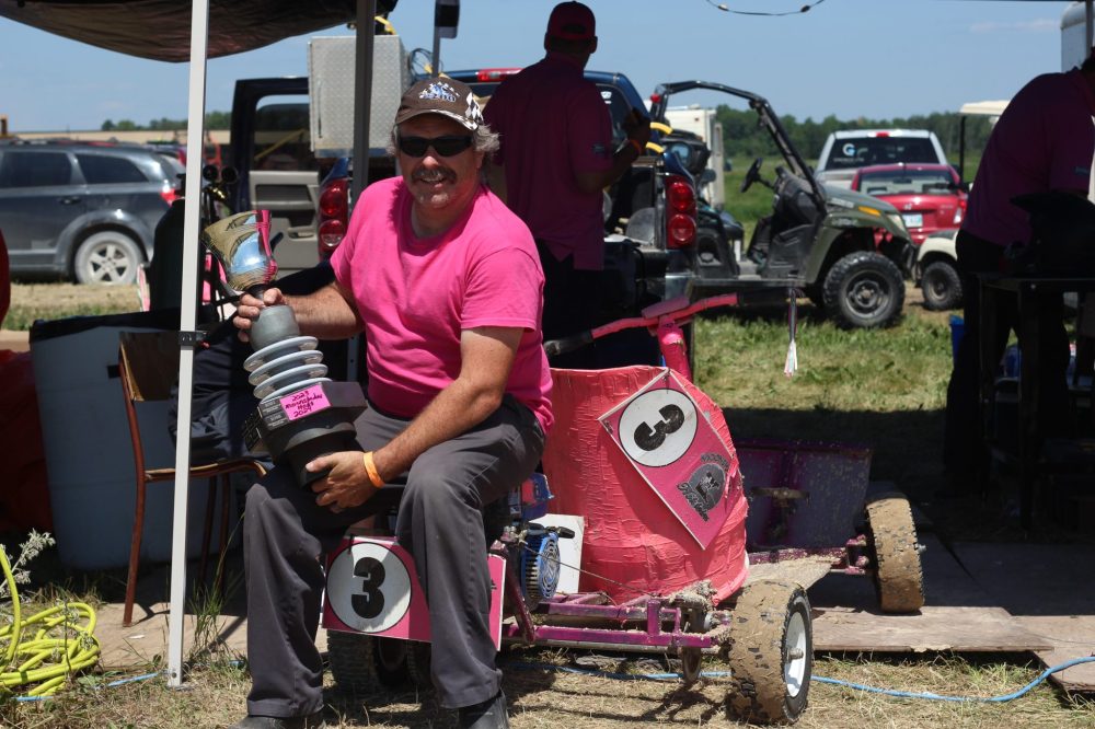 TONI DE GUZMAN THE CARILLON
Joël Grenier sits on the winning 2024 St Labre 200 pink kart while he holds The Spark Plug Cup.
