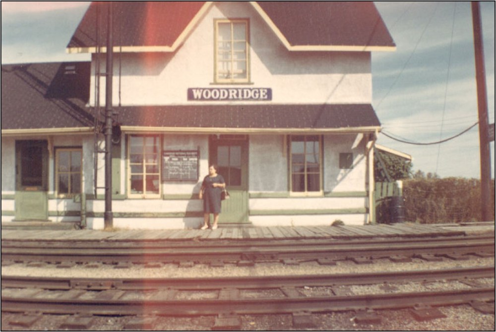 Submitted
A host of Prairie towns sprang to life when railway tracks were laid across the country. One of them was Woodridge as the production of lumber products stimulated construction of the Canadian Northern Railway/Canadian National Railway line. The railway came through Woodridge in 1900 and was the main source of transportation for lumber, goods and people. The train station was built in 1902. It was a two-storey, wooden structure with five rooms on the main floor and four small bedrooms upstairs. The bedrooms were often used by folks in the area who were bound to Winnipeg and didn’t want to miss the train. With the decline of cordwood as a fuel source, the construction of paved highways and transportation advances, the train station became redundant by the late 1970s. The train station was dismantled in 1982 by CN and sold to Bruce MacLeod who had a passion for and collected CNR structures. He moved it to his farm in La Broquerie. CN freight trains still travel through Woodridge as part of the Sprague CNR Subdivision.