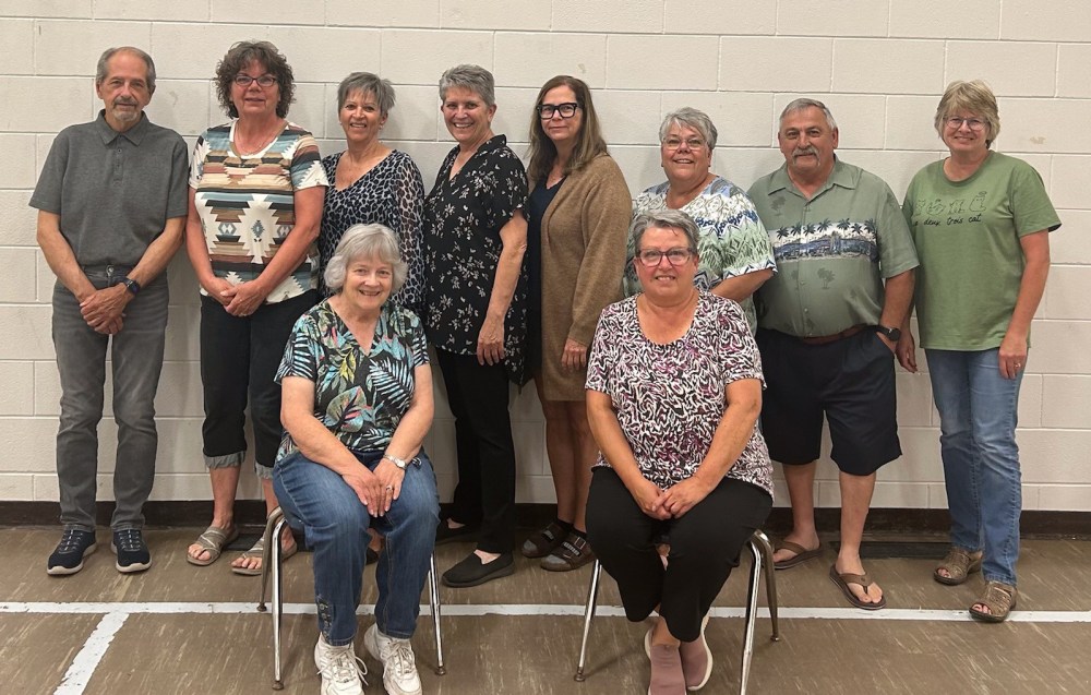 The Woodridge 125 Organizing Committee Front Row (left to right): Elaine Werbeniuk and Rachel Lachnit. Back Row (left to right): Morris Werbeniuk, Cory Jackson, Maureen Eliuk, Janet Chobotar, Tracey Dreyer, Linda Boily, Dennis Tysoski, and Jackie Bergman.