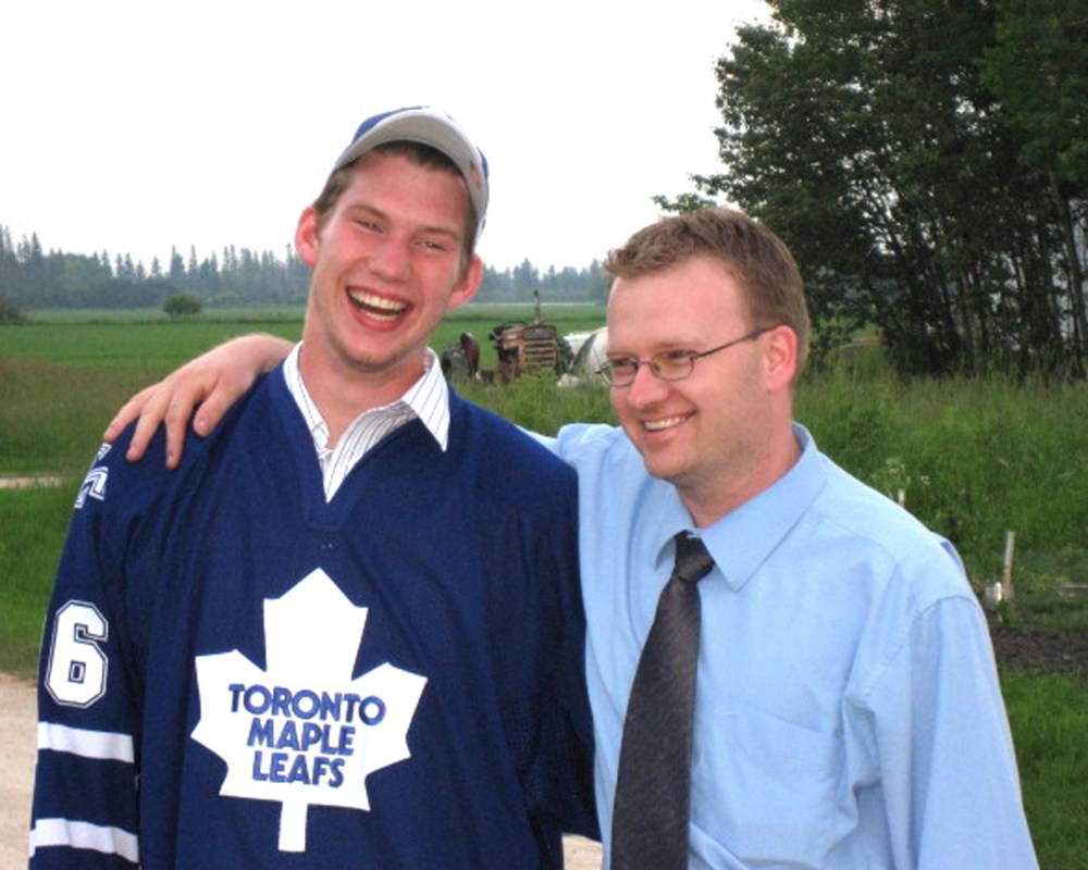 James Reimer celebrates with his agent Ray Petkau following Reimer's selection in the 2006 NHL entry draft by the Toronto Maple Leafs. (Carillon Archives)