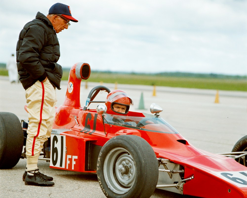 Gary Loewen gets some last minute instructions before heading out onto the track at Gimli to race his Formula Ford Lola to a second place finish in a June, 1974 Formula Ford points event. (Carillon Archives)