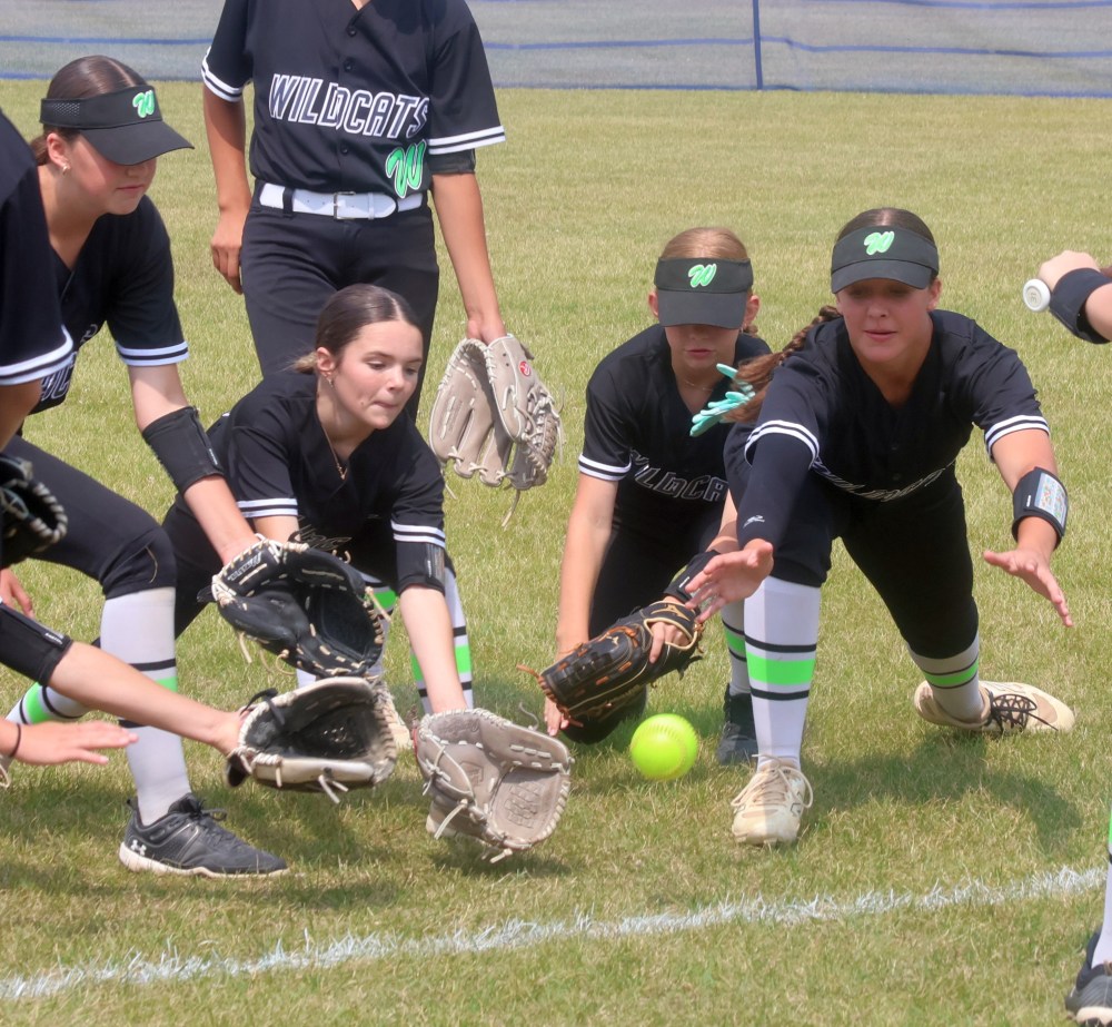 Eastman Wildcats U13 players work on their fielding skills before their first game of the provincial championships, hosted in Friedensfeld. (Cassidy Dankochik The Carillon)