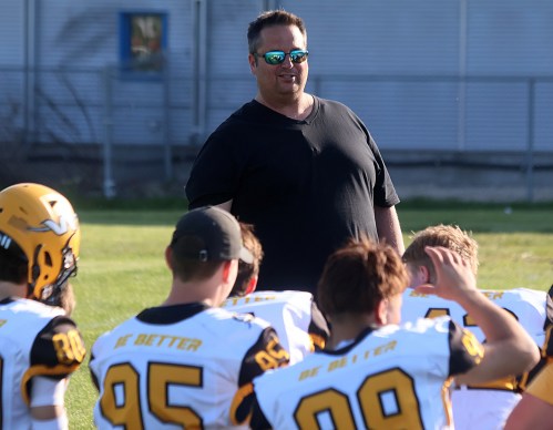 Steinbach Regional Secondary School Varsity football head coach Stephan Fedus, seen here coaching up his team during a spring game against Grant Park earlier this year, will be leading the offensive line for team Manitoba at the upcoming Football Canada Cup. (Cassidy Dankochik Carillon Archives)
