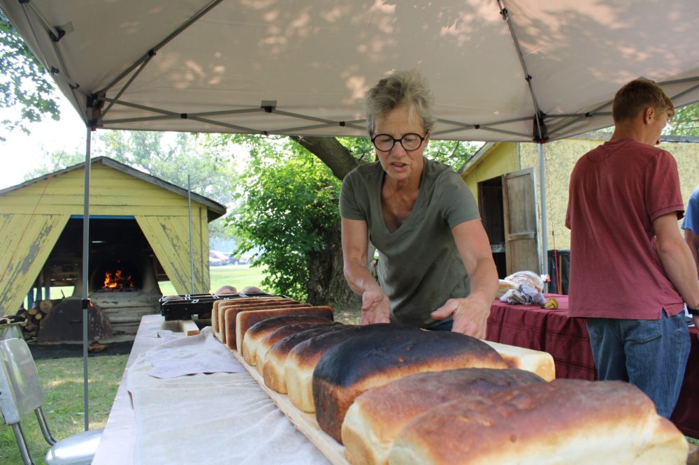 GREG VANDERMEULEN THE CARILLON
Hanna Brandt, one of the committee members responsible for restoring the clay oven, helped bake nearly 100 loaves of bread.