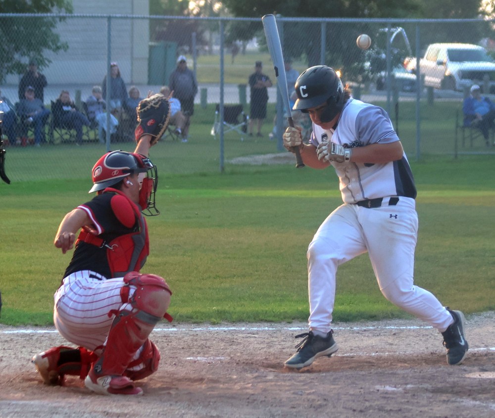 A Carillon Sultans U18 AAA player absorbs a pitch for a free base. (Cassidy Dankochik The Carillon)