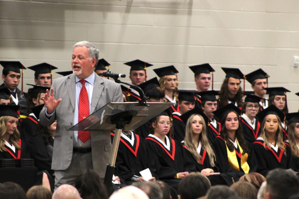CHRIS GAREAU THE CARILLON
Guest speaker Mark Eichhorst, a Niverville High School alumnus who went on to serve as a diplomat, encourages the class of 2025 to explore the world while remembering their roots.