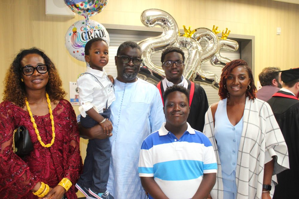 CHRIS GAREAU THE CARILLON
Samaba Sall at his Niverville High School graduation June 25 with his family: Saly (left), Junior, Aly, Mohamed and Risi.