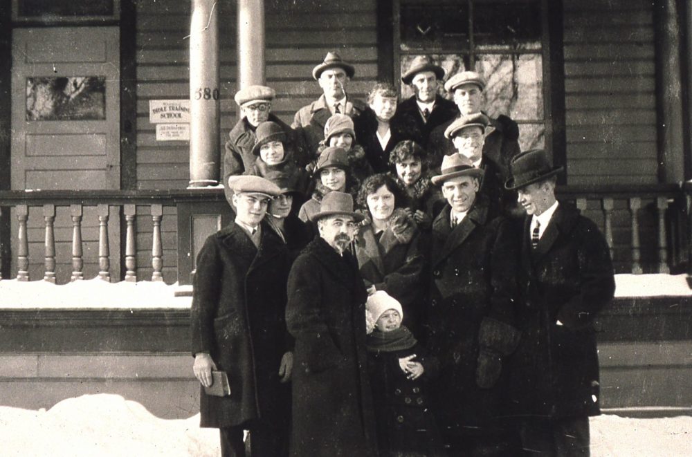 submitted
Rev. Perceval Cundy (front) at the Spence Street campus in 1926. Cundy was one of three faculty members who taught the first year, and was the school's second president after founder Dr. H.L. Turner.
