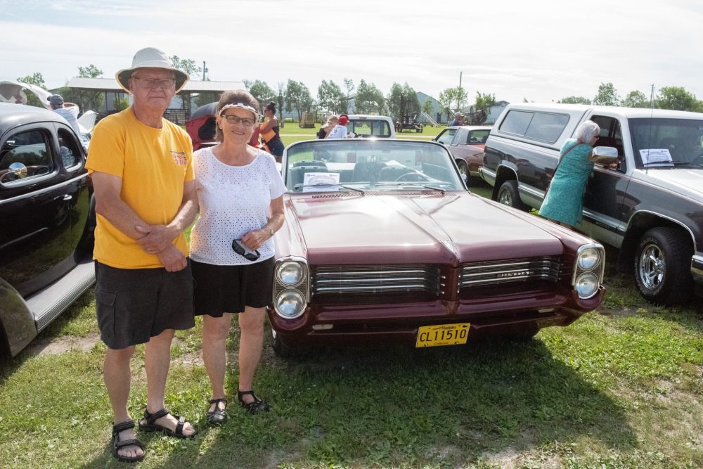 SVJETLANA MLINAREVIC THE CARILLON
Mennonite Heritage Village's Country Classics Car Club Show 'n Shine was held on July 26, 2025. John and Joey Whitehead stand next to their 1964 Pontiac Parisienne Convertable. It took John two-and-a-half years to complete the restoration of the car. It's the seventh car he has restored.