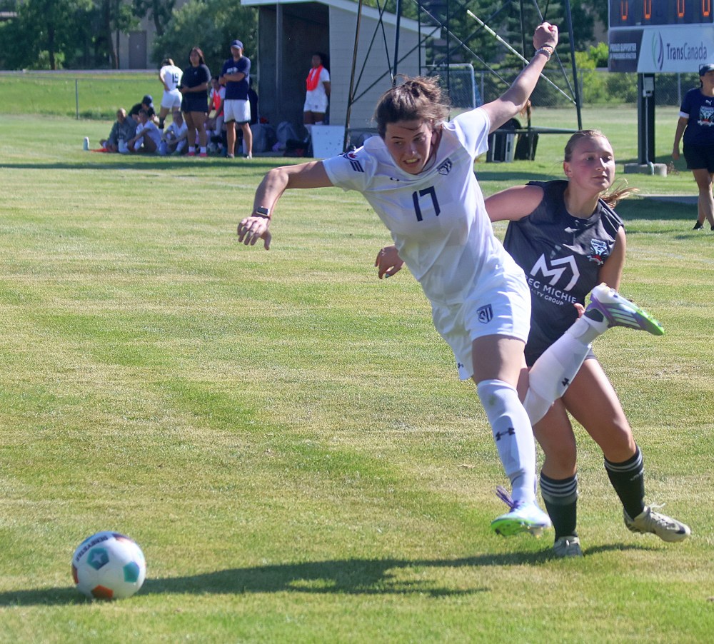 Serena Negrich leaps past a tackler during a Providence Pilots pre-season match Aug. 16. (Cassidy Dankochik The Carillon)