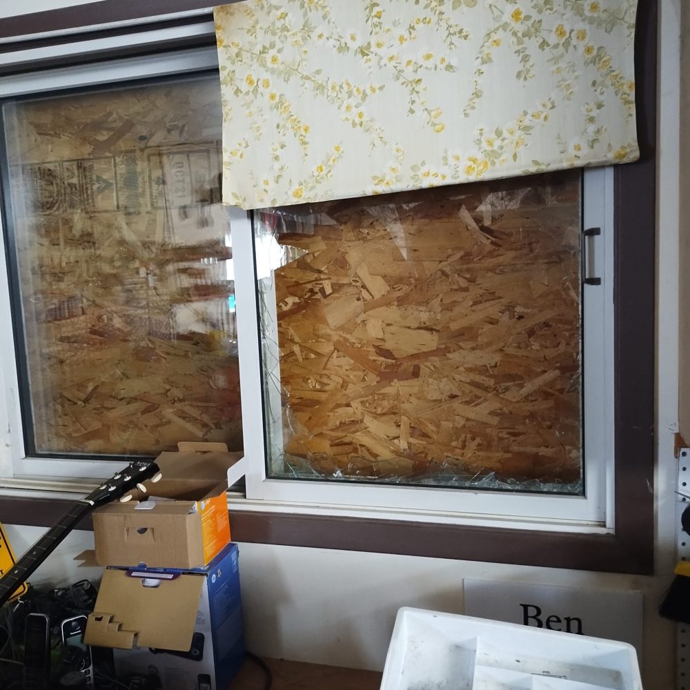 SUPPLIED
One of Morris MCC Thrift Store's broken windows that thieves smashed during an Aug. 11 robbery.