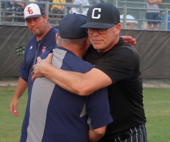 Rick Penner shakes hands with Giants manager Ed Kulyk after Carillon won their second consecutive MJBL championship. Penner will be leading the team to their nationals appearance this season before taking a step back from coaching the junior Sultans. (Cassidy Dankochik The Carillon)