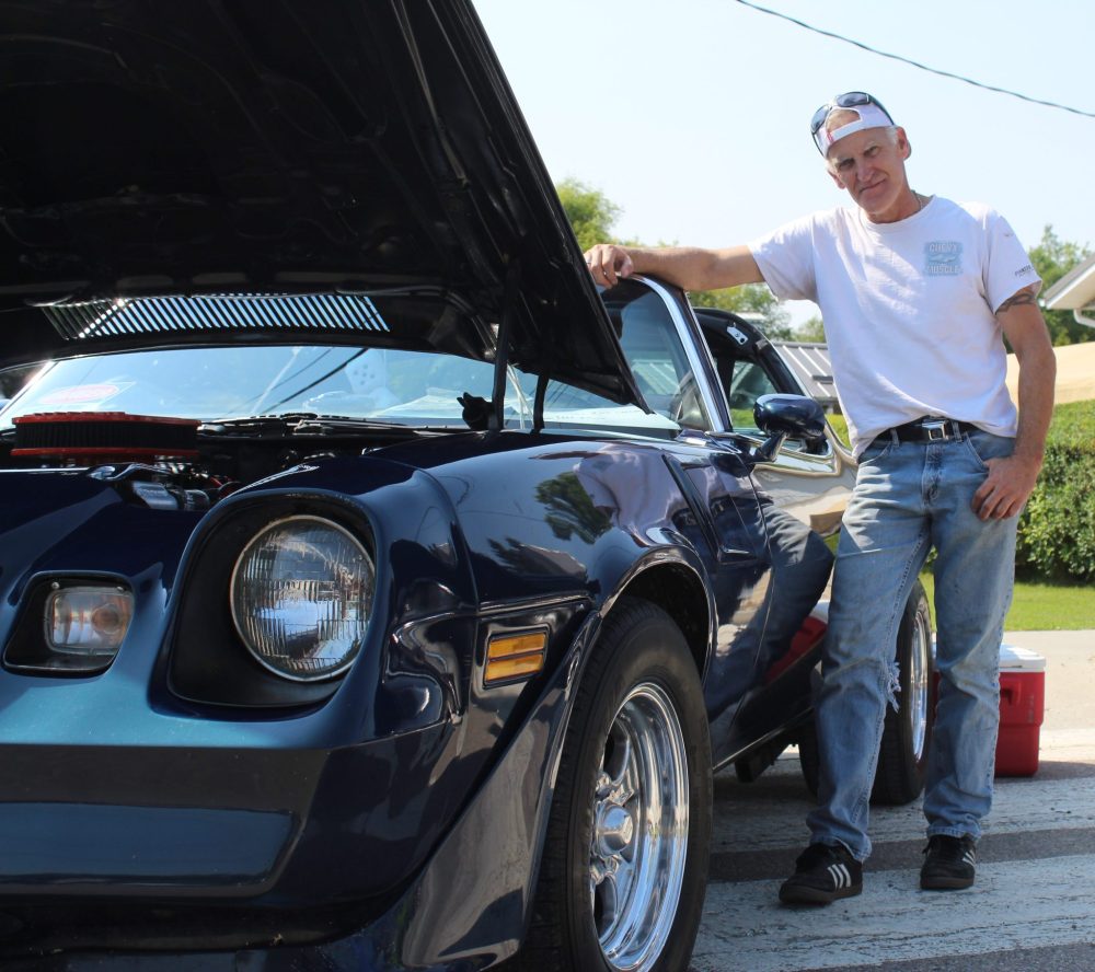 MATTHEW FRANK THE CARILLON
Pete Young stands beside his 1980 Chevrolet Camaro Z28 during Le St Malo Street Bash’s car show. The festival barricaded a stretch of St Malo Street from Aug. 29 to 31. It hosted live music, face painting, carnival games and a farmers market.