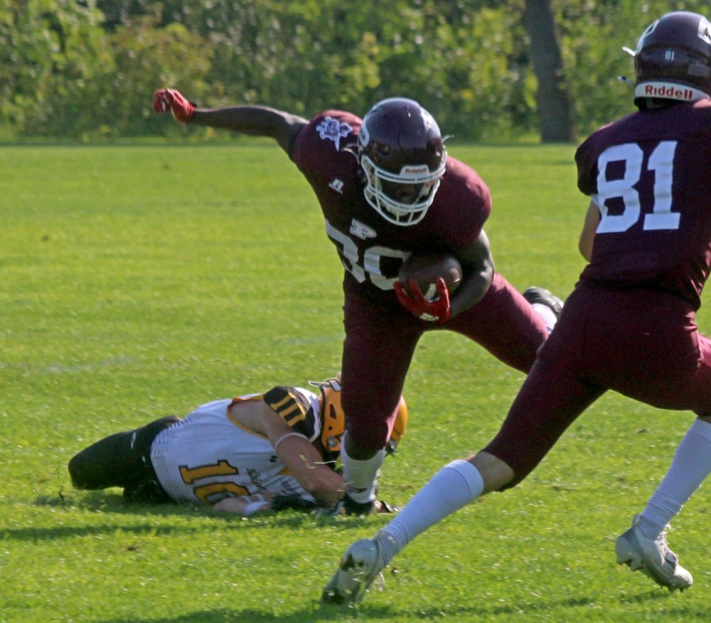 Dylan Godlewski made the transition from receiver to linebacker and his athleticism showed during the pre-season game. (Cassidy Dankochik The Carillon)