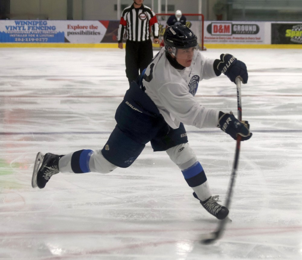 Steinbach defenseman Liam Doyle lets a shot go during pre-season action in Niverville Sept. 12. (Cassidy Dankochik The Carillon)