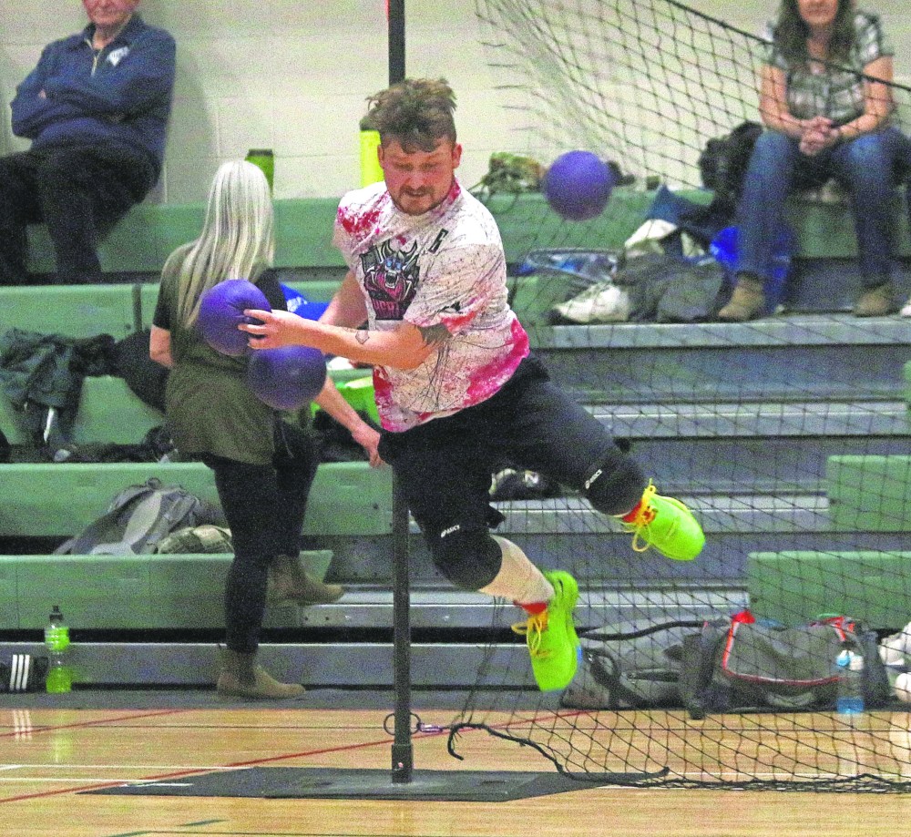 Raiden Kasprick of the Heathans flew through the air to avoid a ball during the Riel Cup provincial dodgeball championships in Niverville April 13, 2025. (Cassidy Dankochik The Carillon)