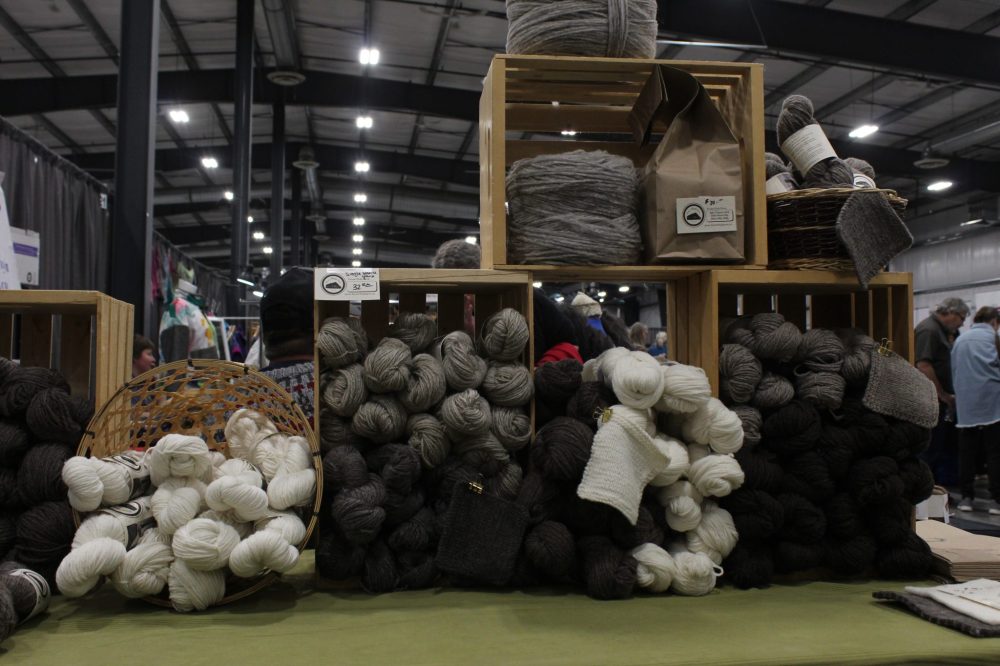 MATTHEW FRANK THE CARILLON
Bundles of wool waiting to be sold at Christel Lanthier's vendor stall.