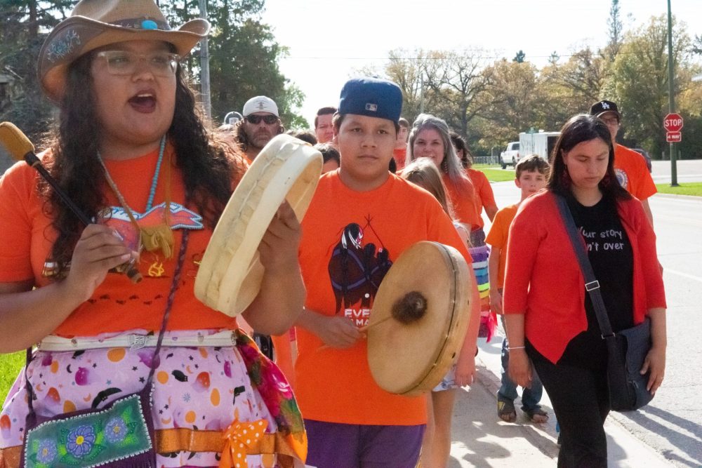 SVJETLANA MLINAREVIC THE CARILLON
Mino Odewin held its Orange Shirt Day Walk on Sept. 30, 2025 which started at city hall in Steinbach and ended at the Steinbach Arts Centre, where a traditional dance was held and a feast was had. Drummers Rayne Ryle and Nev Cheages beat their drums during the walk.