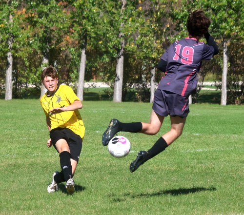 A Niverville player blocks a Lorette shot during the Zone 13 soccer championships Oct. 2. (Cassidy Dankochik The Carillon)