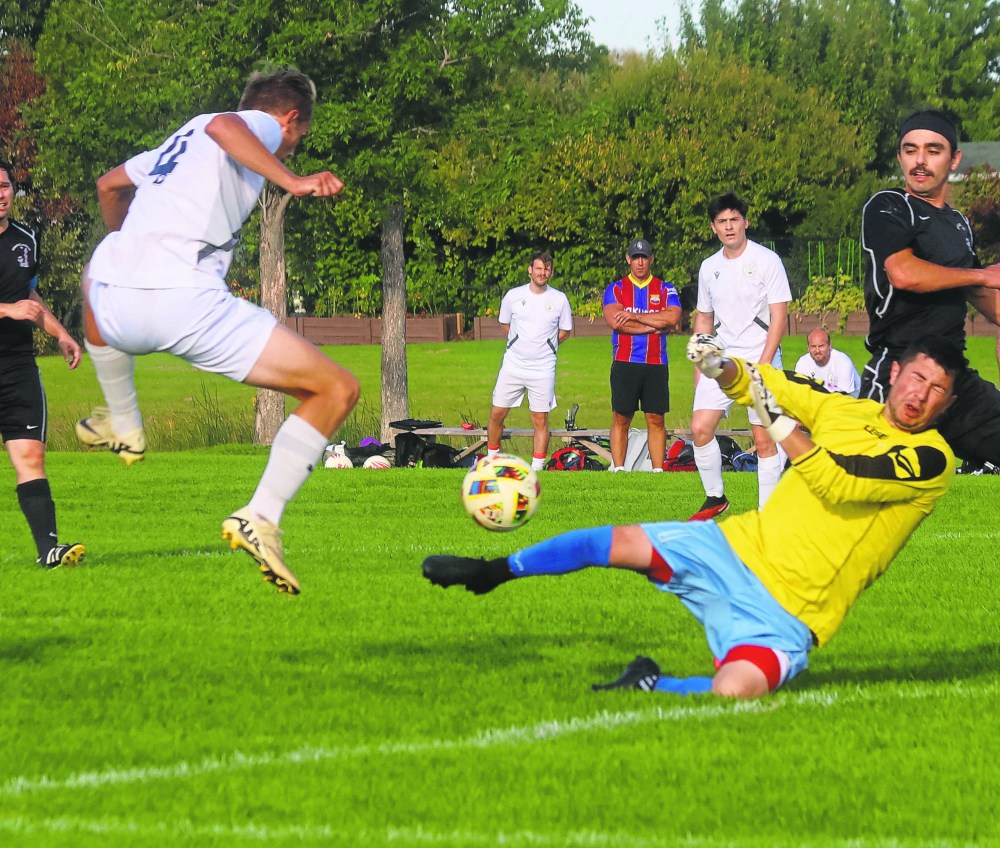 The CSSE Juventus keeper did just enough to keep this Hanover Kickers attempt from hitting the back of the net Sept. 13. The late-season win helped the Kickers earn promotion this year. (Cassidy Dankochik The Carillon)