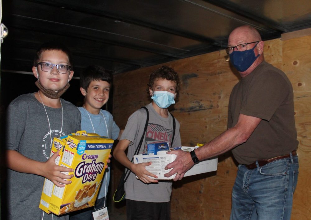 JORDAN ROSS CARILLON ARCHIVES
This photo from 2021 shows local youth delivering their food to South East Helping Hands.