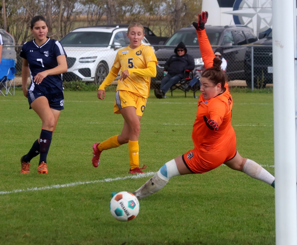 Providence keeper Blake Forester gets a toe on this Brandon shot. She was named the Pilot of the game in the team's 2-2 draw with Brandon. (Cassidy Dankochik The Carillon)