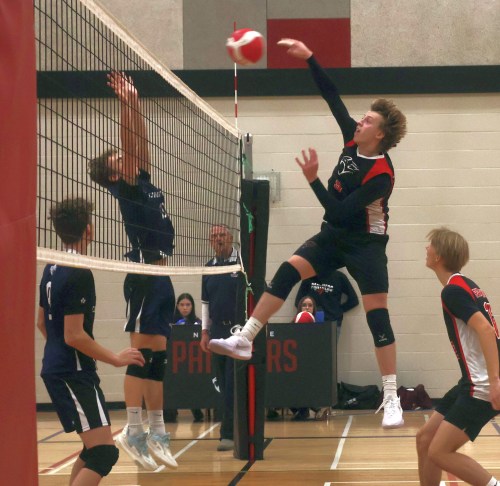 Setter Ryan Smeltz took advantage of a slow reaction to spike the ball himself for the winning point as Niverville beat Steinbach Christian School in straight sets to win the Zone 13 AAA banner. (Cassidy Dankochik The Carillon)
