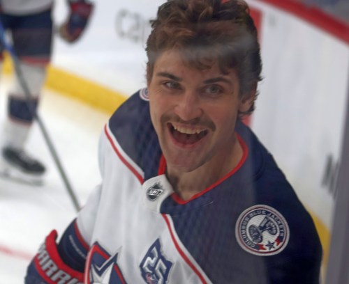 Denton Mateychuk flashes a smile to some of his fans during warm-ups for the Columbus/Winnipeg NHL game Nov. 18. (Cassidy Dankochik The Carillon)