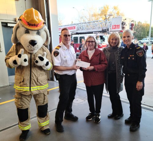 Submitted
Steinbach Fire Department
Presentation made at the Steinbach fire department open house Oct. 7.
(L to R) Sparky, Kelvin Toews (Chief), Mary Jane Hiebert (SCF chair), Deb Rempel (SCF governance), Cindi Klassen (Lt. and public education officer).