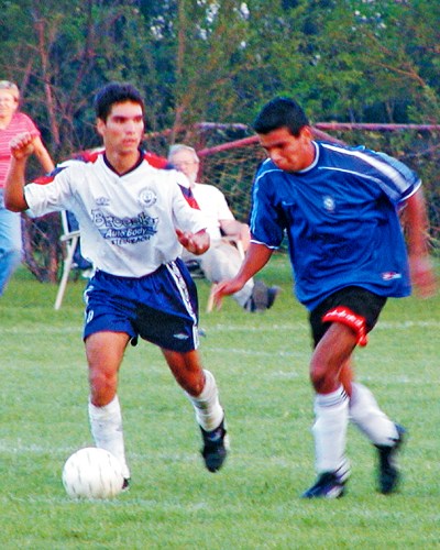 Hanover Kickers Jake Flores closes in on a F C Salsero player during a 4-0 win for the home team at A.D. Penner Park in August. The tables were turned in September, when FC Salsero edged the Kickers 3-2 in overtime to eliminate the Steinbach team from the Manitoba Central Soccer League playoffs.
