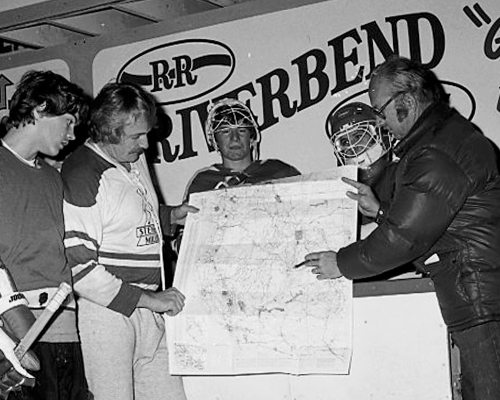 The Steinbach Millers U18 hockey team get a geography lesson before heading out for their longest road trip of the year. Team manager Bob Loewen and coach Randy Penner display a map outlining the just over 2,000 km route from Steinbach to Salt Lake City, Utah.