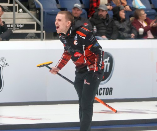 Ross Whyte yells in excitement after his double-takeout in the final end ran Kyle Waddell out of stones. (Cassidy Dankochik The Carillon)