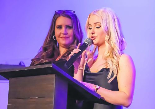 SVJETLANA MLINAREVIC THE CARILLON ARCHIVES 

Agape House executive director Tracy Whitby (left) and outreach and housing coordinator Lisa Fast speak during last year’s Purple Gala. Every year, the gala rises funds for the women’s shelter. Last year, Agape House raised $20,000, the most in the three year history of the gala at the time. Fast hopes this year’s gala will raise the same or more than last year.