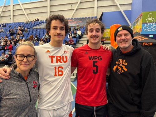 The Koop family joined twins Tyson and Paxton for a battle between their two teams in CanadaWest volleyball action last year. (Submitted photo)